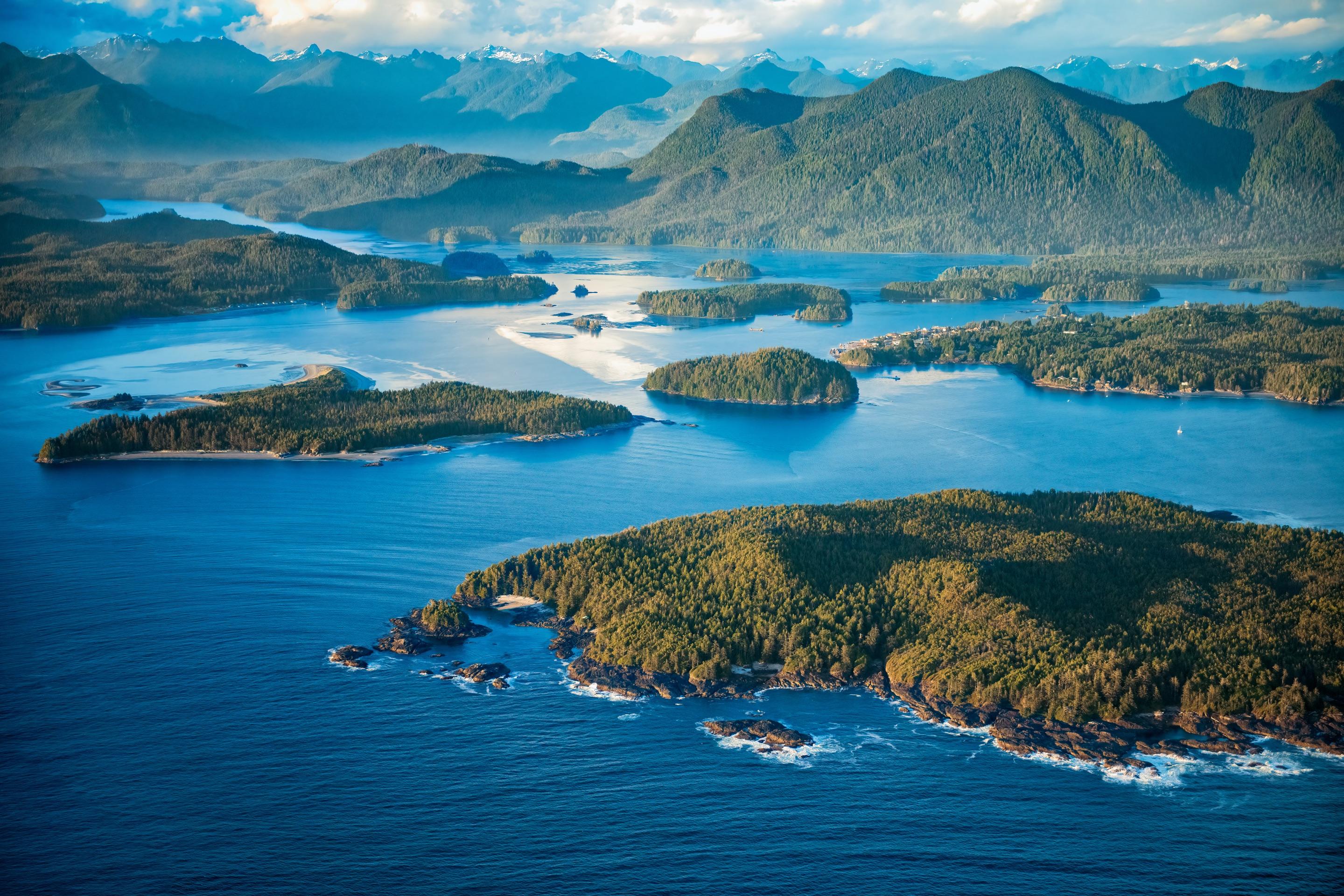 Aerial view of the islands, forest, and mountains of Clayoquot Sound near Tofino