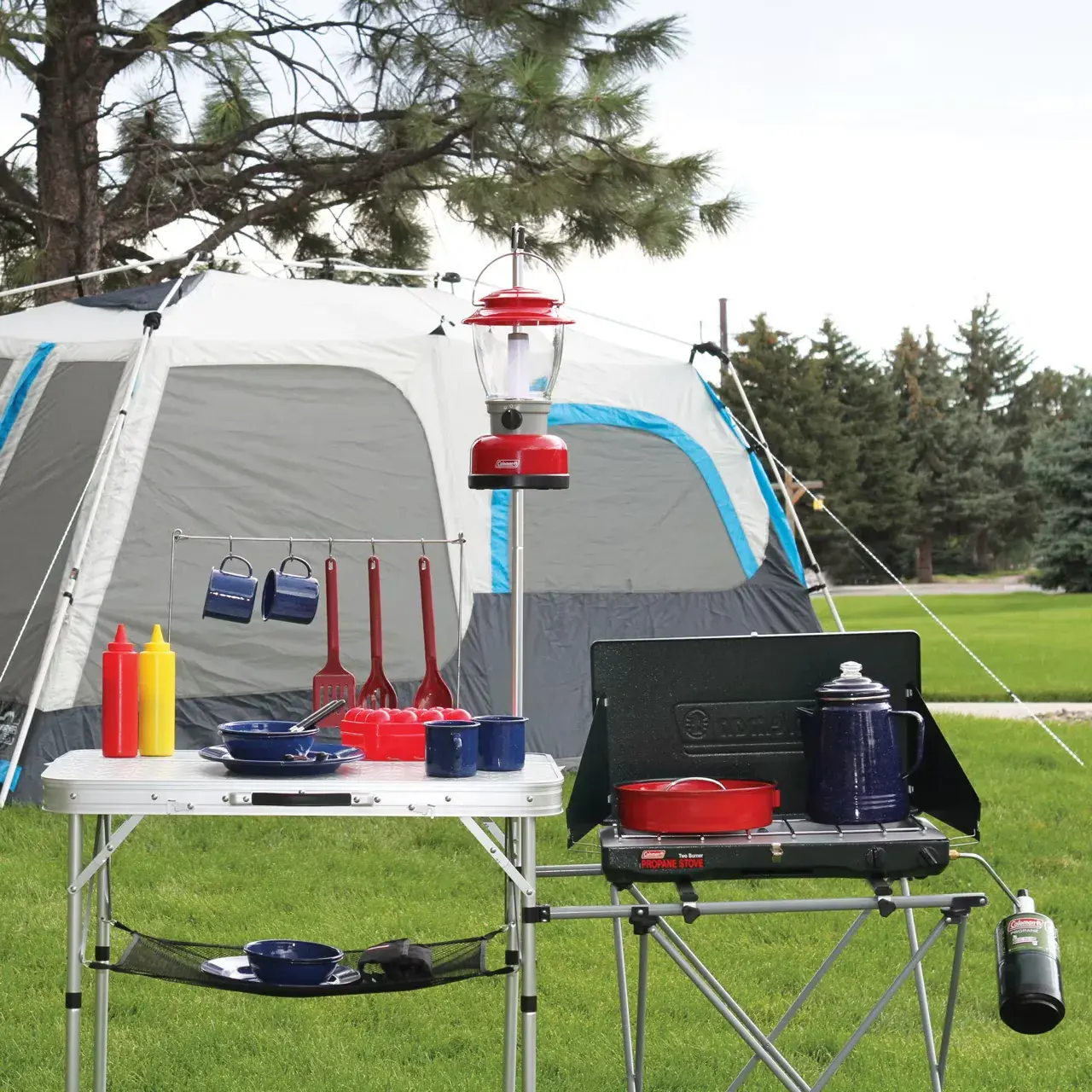 Coleman Pack Away Outdoor Kitchen in use at a campsite