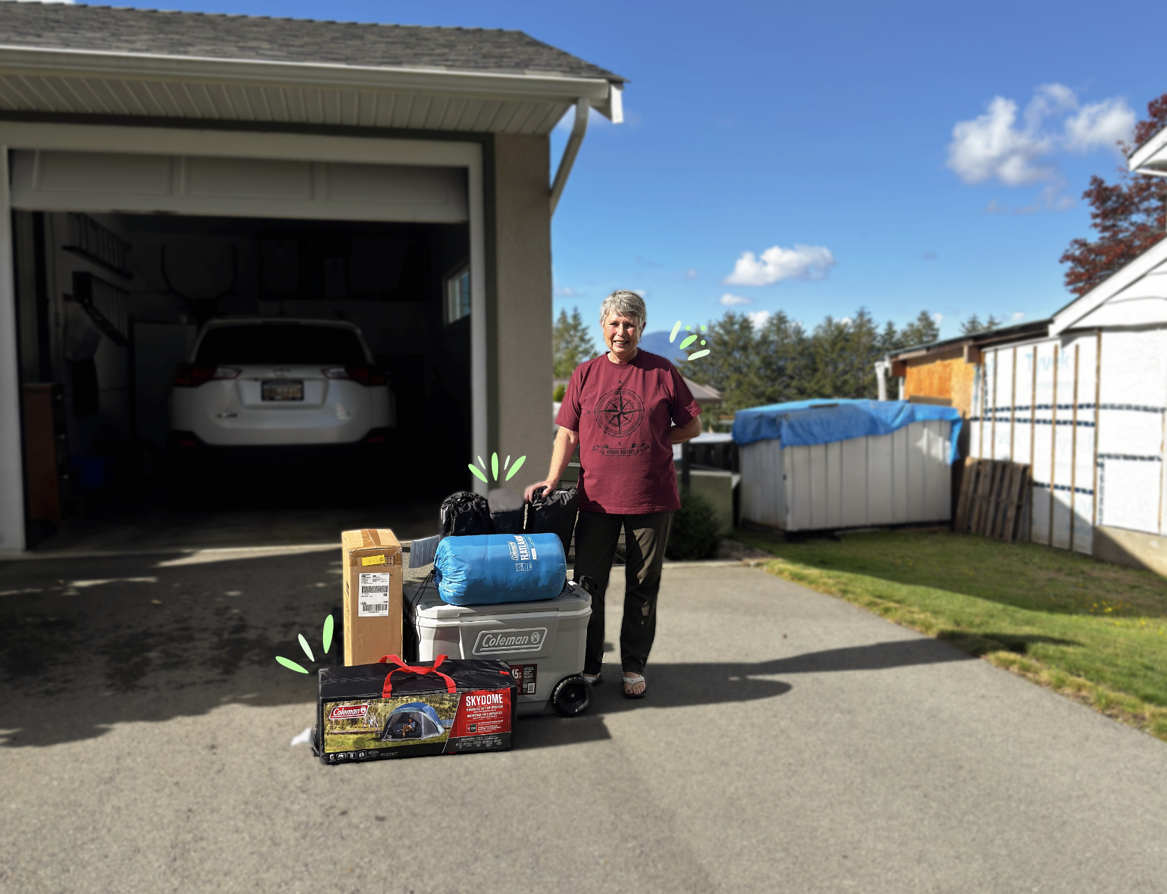 Susan W. standing with her Sporting Life and Coleman outdoor prize pack